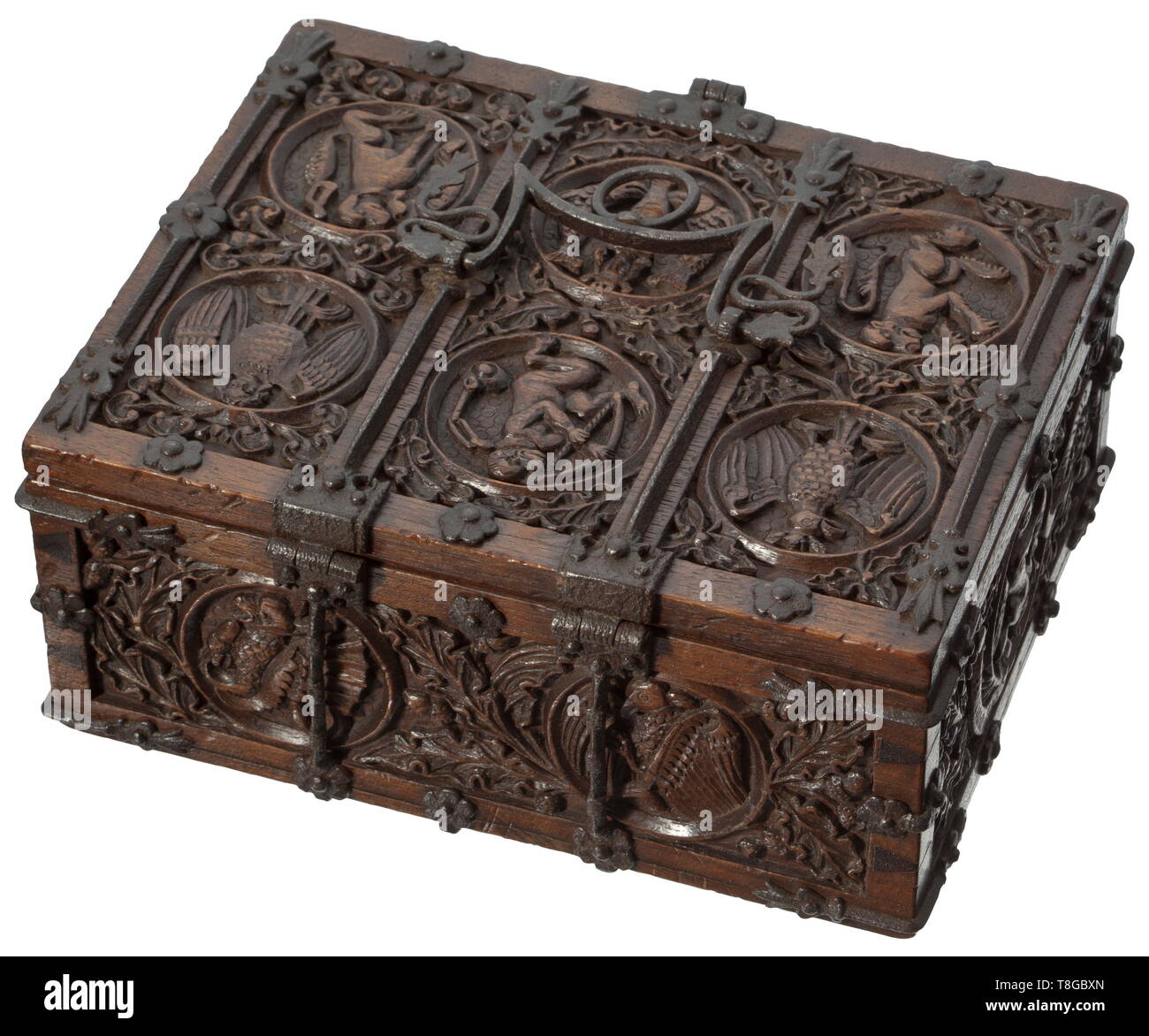 A casket in late Gothic style Oak wood, completely decorated with finest carvings, therein medallions with allegoric figurative depictions, partly with banners, iron fittings, wrought-iron carrying handle, complete with lock and key. 9 x 20 x 16 cm. Very beautiful work from the period of historicism. historic, historical, handicrafts, handcraft, craft, object, objects, stills, clipping, clippings, cut out, cut-out, cut-outs, 19th century, Additional-Rights-Clearance-Info-Not-Available Stock Photo