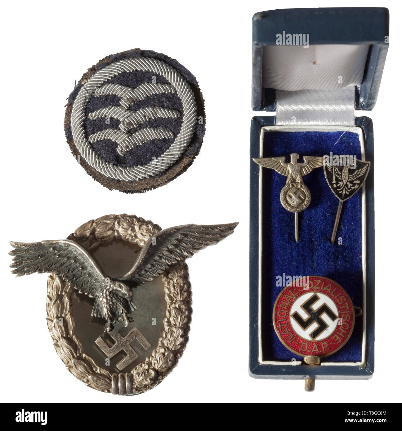 Armin Florian (1924 - 1944) - decorations, passes, identity documents Pilot´s Badge in non-ferrous metal issue of maker W. Deumer, Lüdenscheid with jeweller-type affixed back plate (one nut missing) engraved with (tr) 'To Gefreiter Armin Florian on 5 February 1944 from his father'. Also, a party eagle, a stickpin of the Adolf Hitler Schools, a Party Badge, a Glider Pilot Badge C (hand-embroidered), an NSFK flight logbook (with photo and an entry for the Glider Pilot Badge), an HJ identity book (with photo), two HJ shooting books, and a DLRG basic license with photo. The son, Editorial-Use-Only Stock Photo