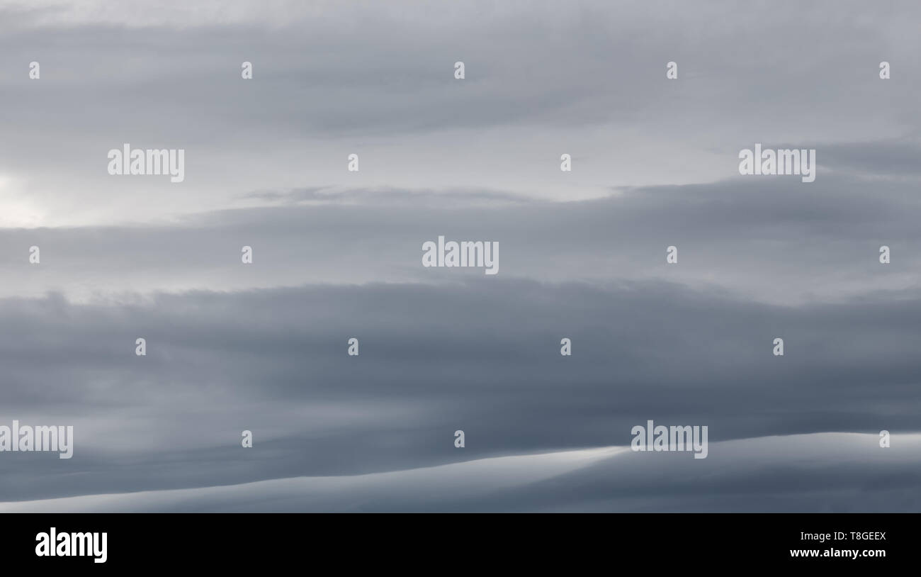 Sky with dramatic dark storm clouds. Sky before rain. Stock Photo