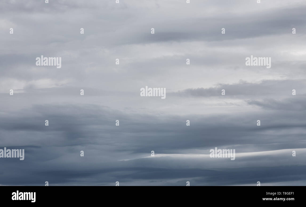 Sky with dramatic dark storm clouds. Sky before rain. Stock Photo