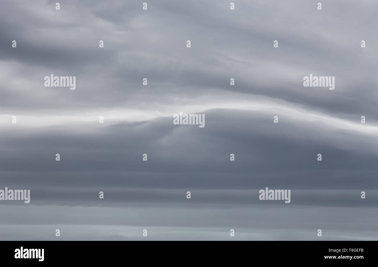 Sky with dramatic dark storm clouds. Sky before rain. Stock Photo