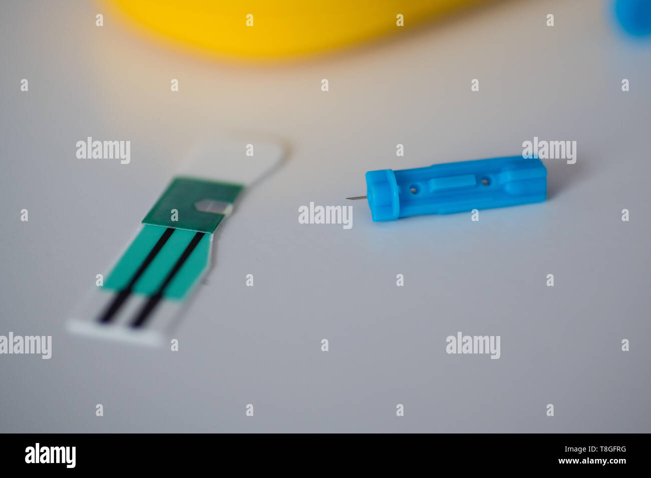 Blood test strip and lancet for glucose self test and urinal acid in