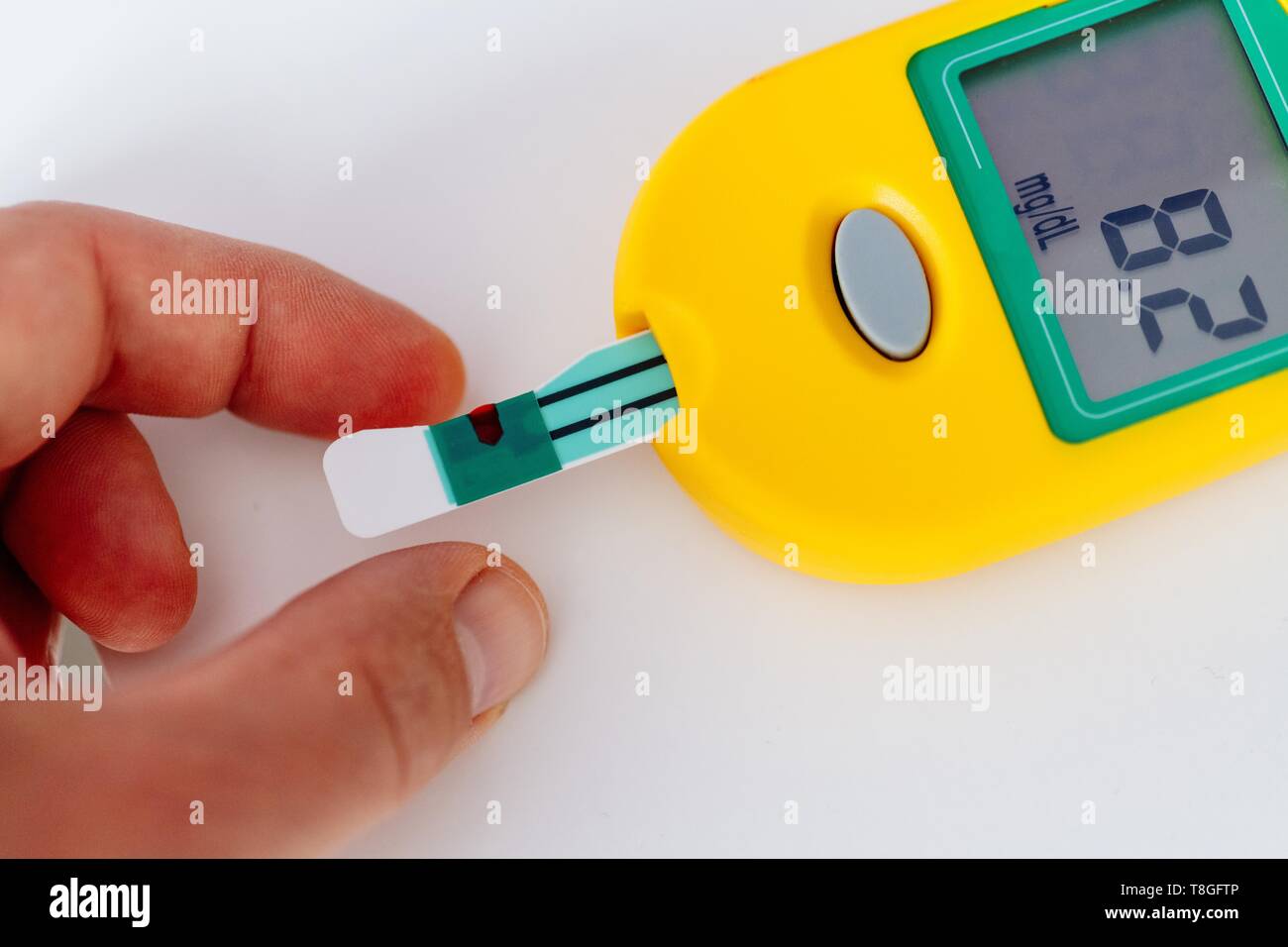Blood uric acid level test. Urinal acid level meter Stock Photo - Alamy
