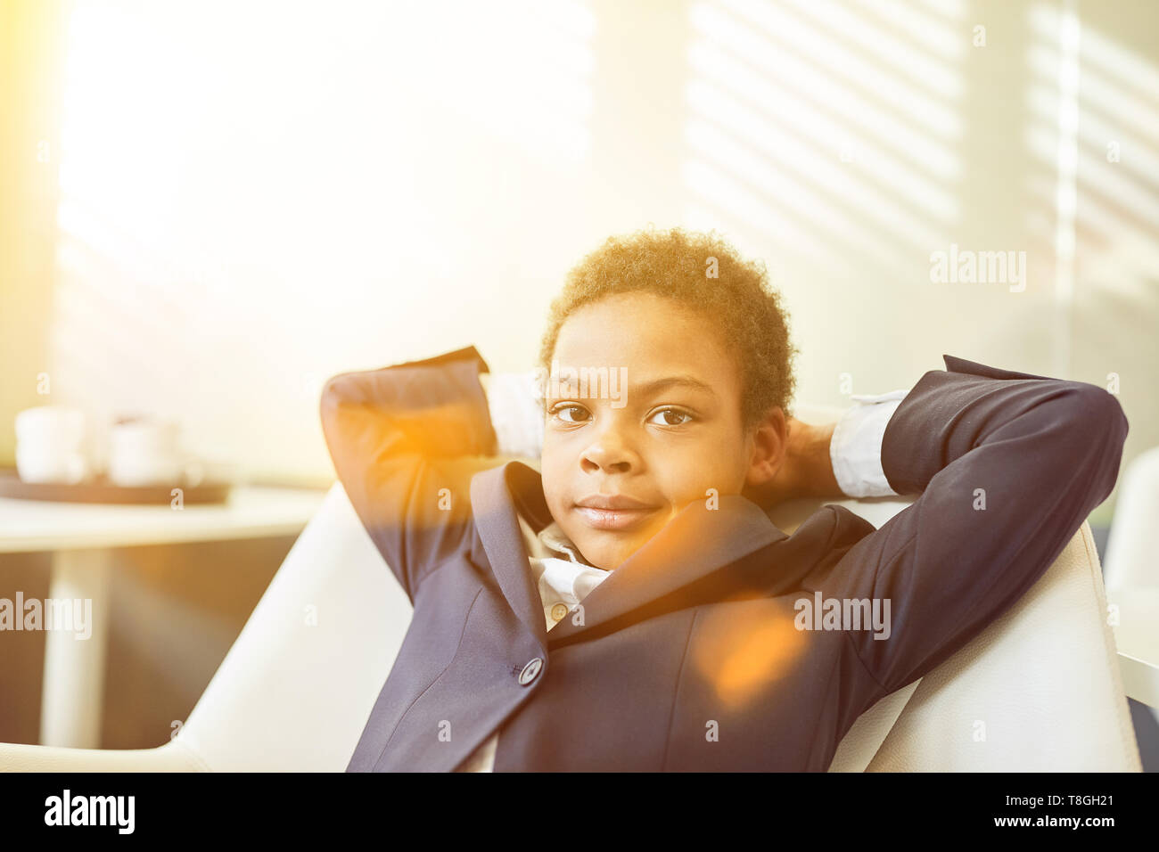 Arms crossed behind head hi-res stock photography and images - Alamy
