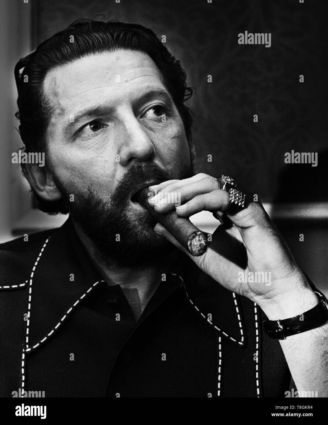 Jerry Lee Lewis poses, smoking a cigar, backstage at The Palladium in ...