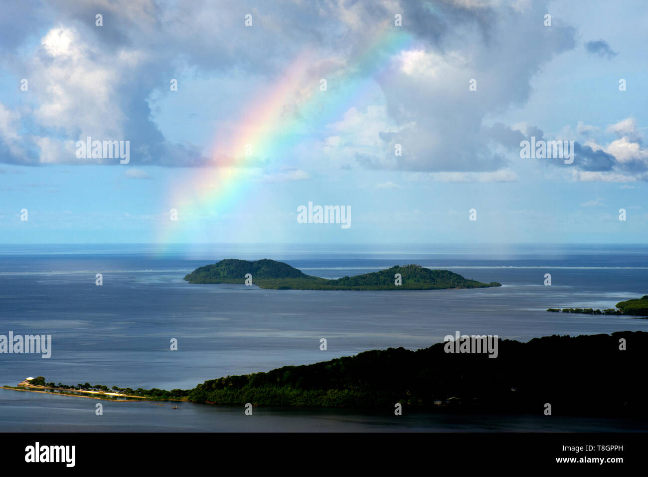 Aerial view of the lagoon of Pohnpei with a rainbow, Federated States of Micronesia Stock Photo