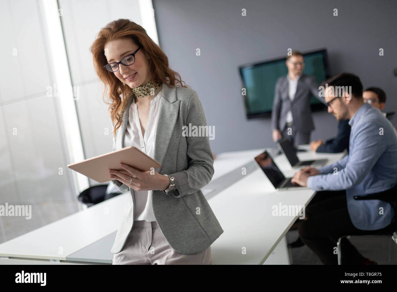 Group of architects and business people working together Stock Photo ...