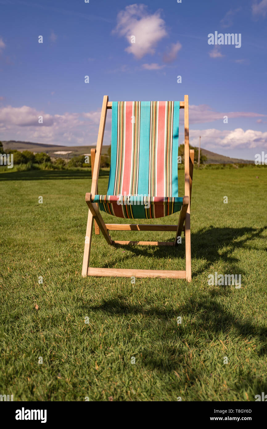 Deck Chair on Lawn Stock Photo - Alamy