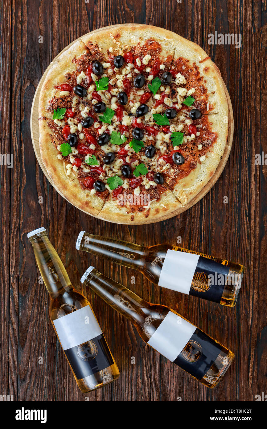 Pizza, beer, on a wooden table, pub, pizzeria, sports bar, Top view