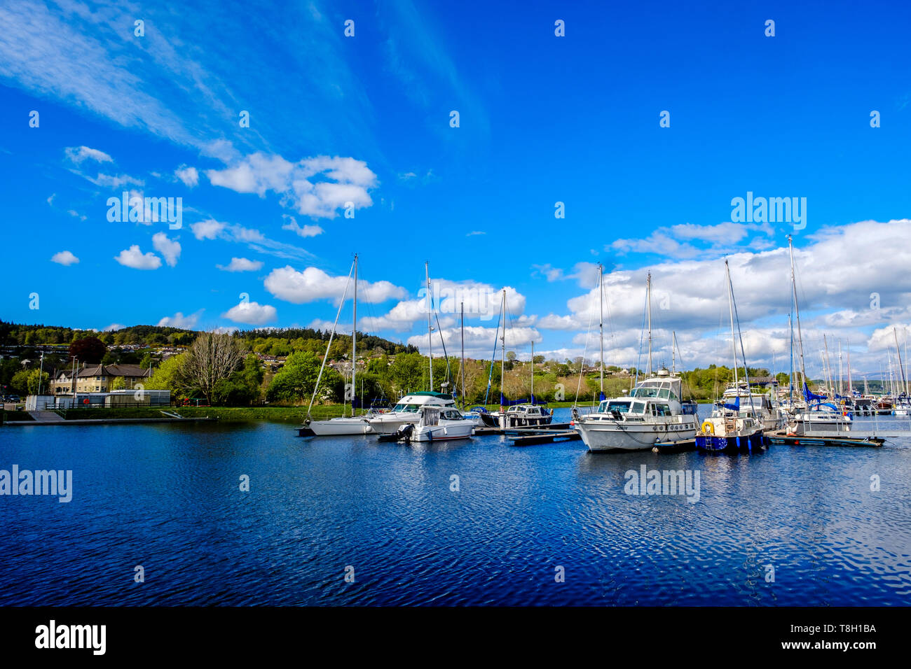 Yachts anchored in the marina on the Caledonian Canal in Inverness, Scotland on a spring morning. Stock Photo