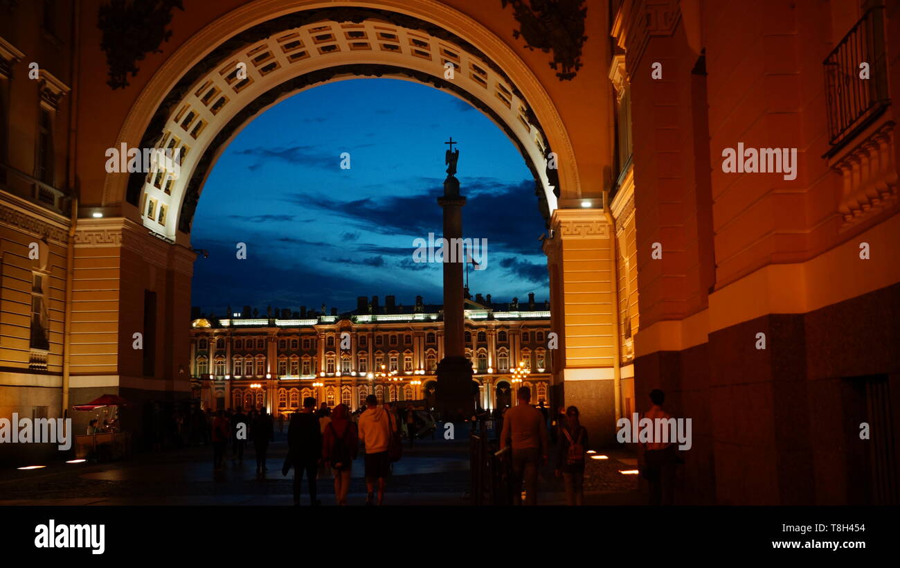 View through the arched doorway to the Palace Square in St. Petersburg with the silhouette of the Alexandrian column Stock Photo