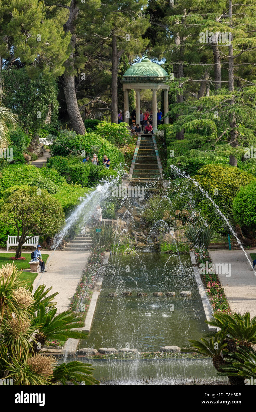 France, Alpes Maritimes, Saint Jean Cap Ferrat, villa and gardens Ephrussi de Rothschild, the French garden, large pond and water jets // France, Alpe Stock Photo