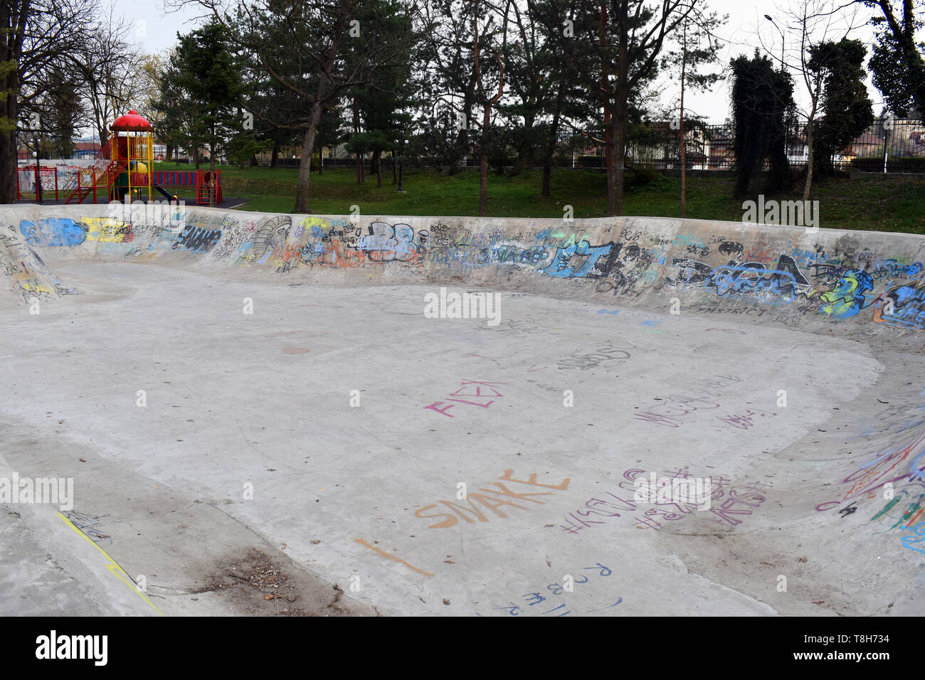 skating skate park skatepark design skateboard skateboarding empty concrete with graffiti Stock Photo