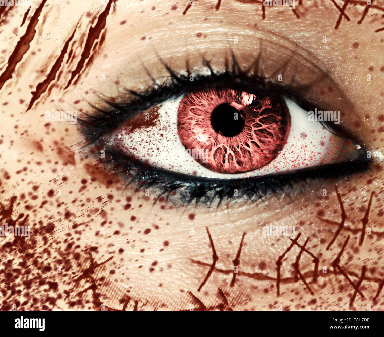 Closeup view of female's horror eye with many scars on the face Stock