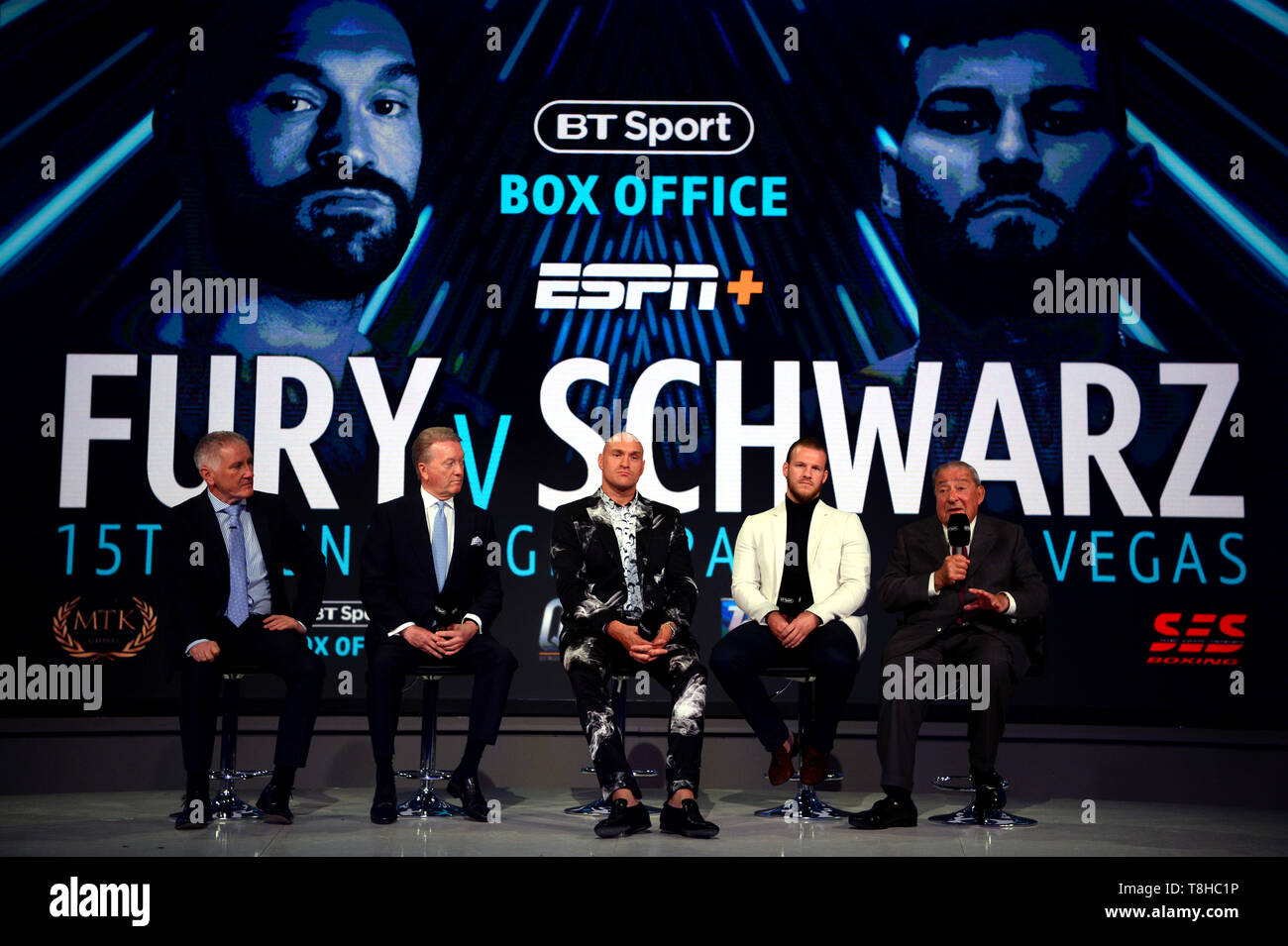 From left to right) BT Sport commentator John Rawling, promoter Frank  Warren, Tyson Fury, trainer Ben Davison and promoter Bob Arum during the  press conference at BT Sport Studio, London Stock Photo -