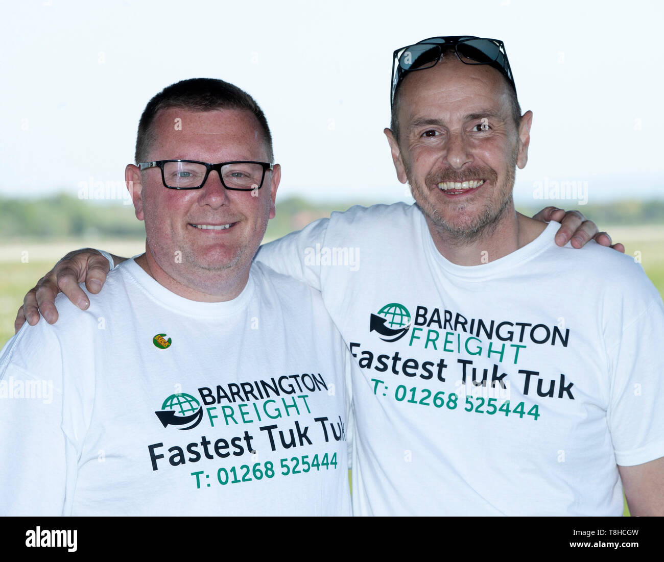 Essex businessman Matt Everard (left) and his passenger Russell Shearman ahead of setting a world land speed Guinness World Record in a tuk tuk at Elvington Airfield in Yorkshire. Stock Photo