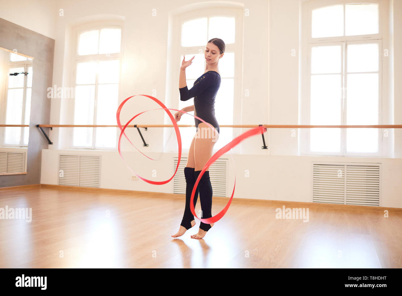 Girl performing with ribbon Stock Photo - Alamy