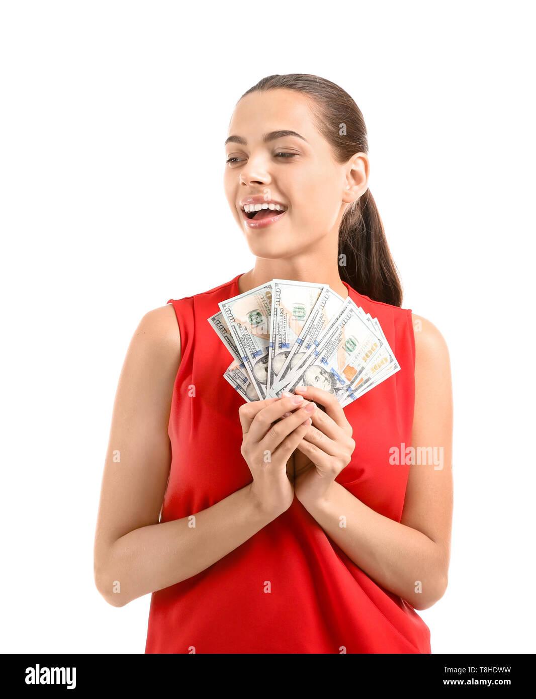 Happy young woman with dollar banknotes on white background Stock Photo ...
