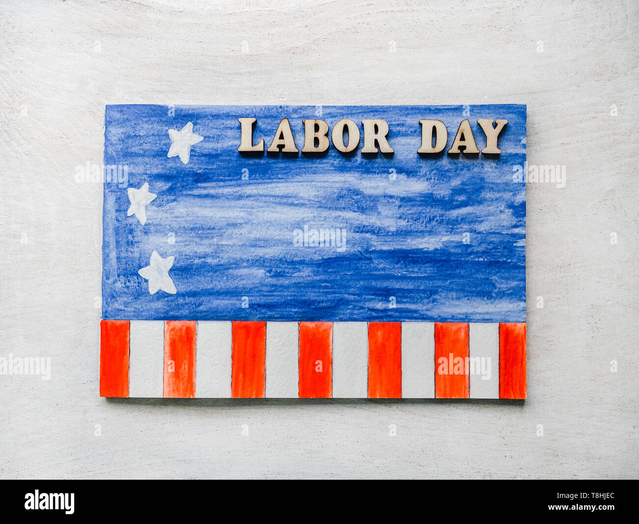 Beautiful card with congratulations on Labor Day Stock Photo