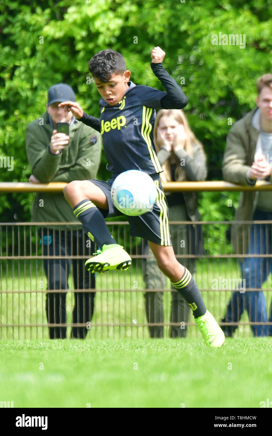 11 May 2019, North Rhine-Westphalia, Kempen-Tönisberg (Kreis Viersen/: Cristiano  Ronaldo Jr. plays at a youth football tournament in the jersey of Juventus  Turin. The football tournament of the U9 junior teams took