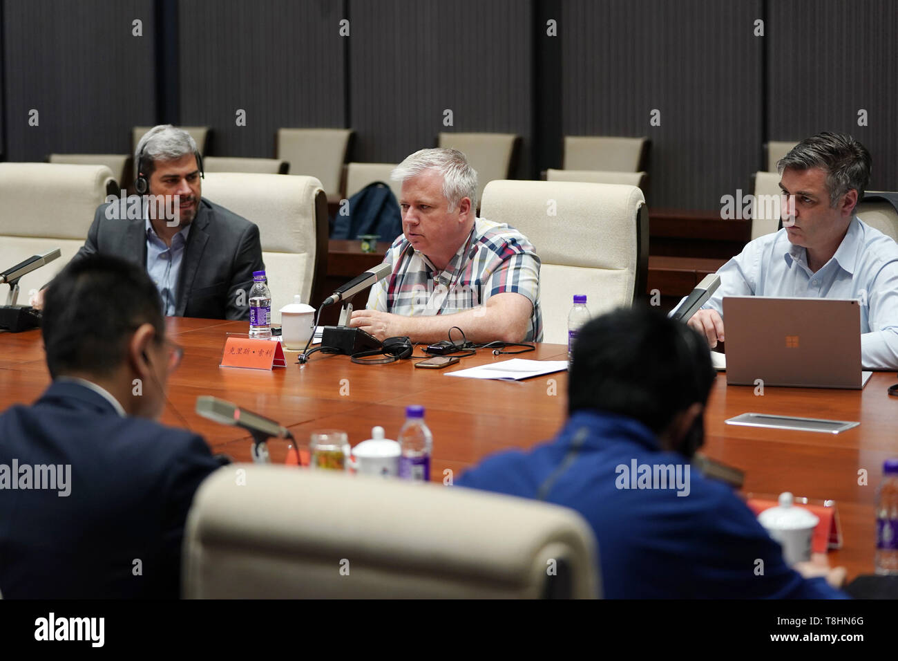 Beijing, China. 13th May, 2019. Chris Solly (C), program lead of the Executive Learning Pathway (ELP) faculty, speaks during the first ELP for Beijing 2022 held in Beijing, capital of China, on May 13, 2019. Credit: Ju Huanzong/Xinhua/Alamy Live News Stock Photo