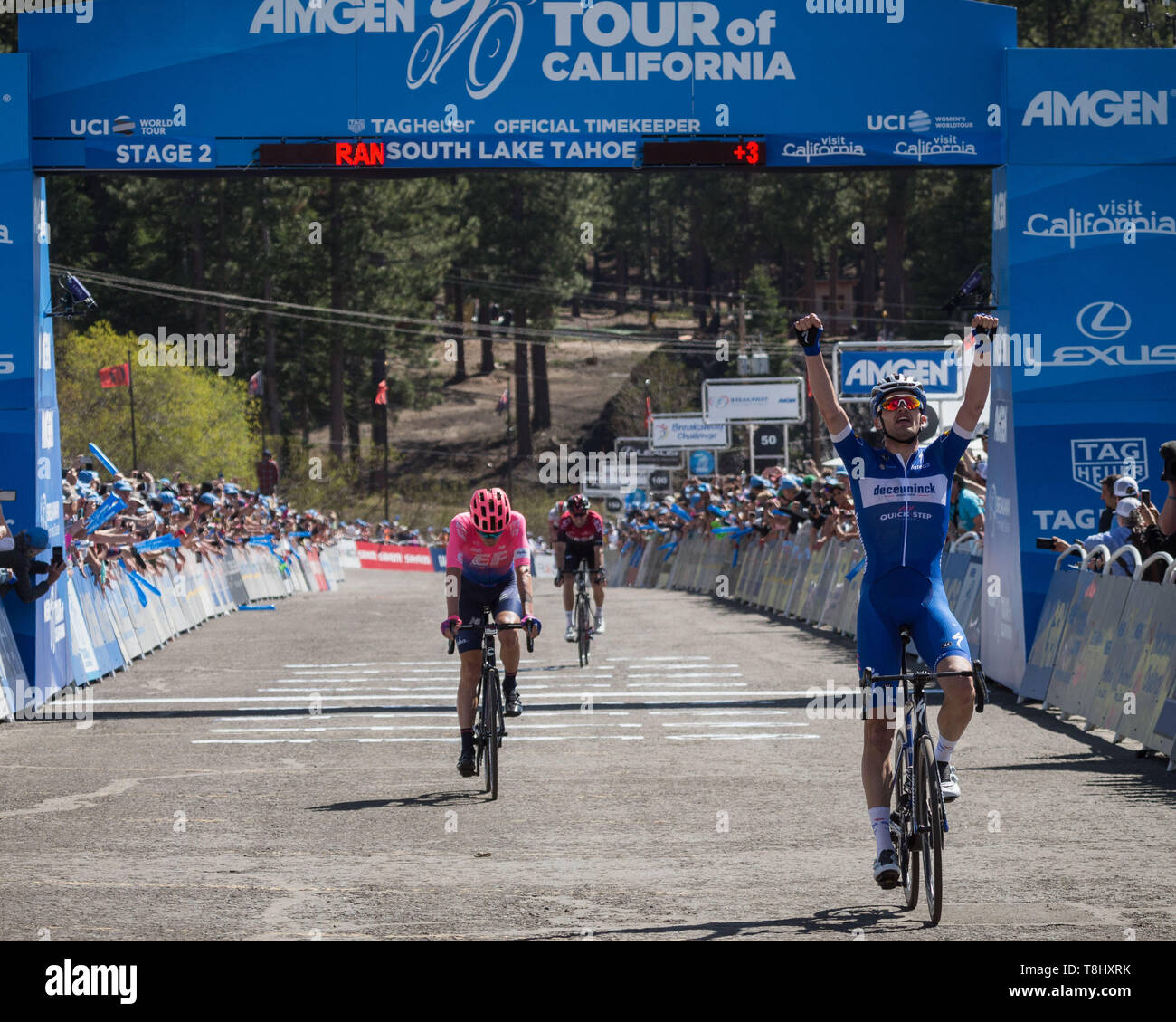 South Lake Tahoe California USA. 13th May 2019. KASPER ASGREEN Team Deceuninck Quick Step BEL celebrates his Stage 2 victory in South Lake Tahoe on Monday with Team EF Education First USA TEJAY VAN