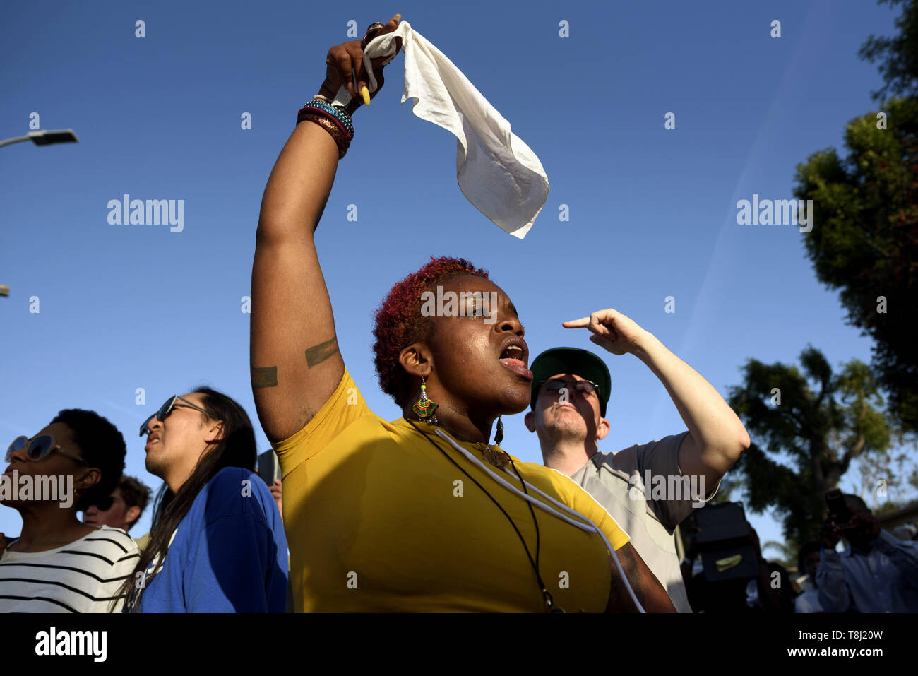 Los Angeles, CA, USA. 4th May, 2019. A woman seen chanting slogans guring the festival.People gather at a festival celebrating the renaming of Rodeo Road to Obama Boulevard, in honor of former US President Barack Obama in Los Angeles, California. Credit: Ronen Tivony/SOPA Images/ZUMA Wire/Alamy Live News Stock Photo