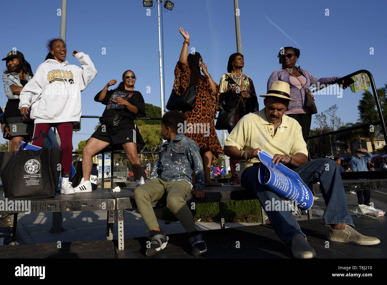 Los Angeles, CA, USA. 4th May, 2019. People seen having fun during the festival.People gather at a festival celebrating the renaming of Rodeo Road to Obama Boulevard, in honor of former US President Barack Obama in Los Angeles, California. Credit: Ronen Tivony/SOPA Images/ZUMA Wire/Alamy Live News Stock Photo