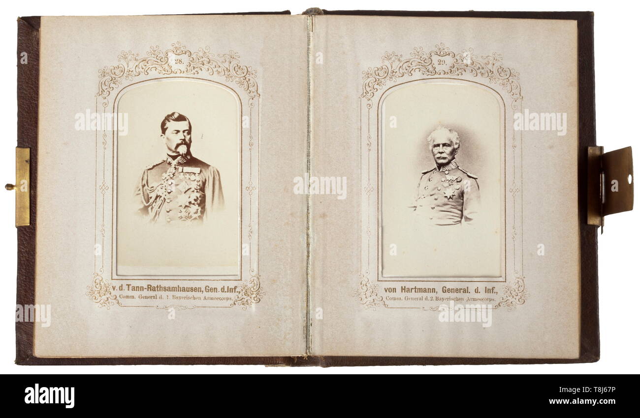 A carte de visite photograph album on the 1870/71 war with 50 inscribed photographs of monarchs and army commanders in uniform with orders and decorations Made of pressed leather, the cover bearing an inscription in gold (tr.) 'The whole of Germany it is to be', eagle and Iron Cross 1813/1870 and the motto (tr.) 'Unity is strength'. Brass clasp on the side, the leather binding is slightly faded. The inside is inscribed as a commemorative album with 50 carte de visite photographs (3rd edition), published by G.F. Großmann, Weißensee. The album contains 50 photographs, some re, Editorial-Use-Only Stock Photo