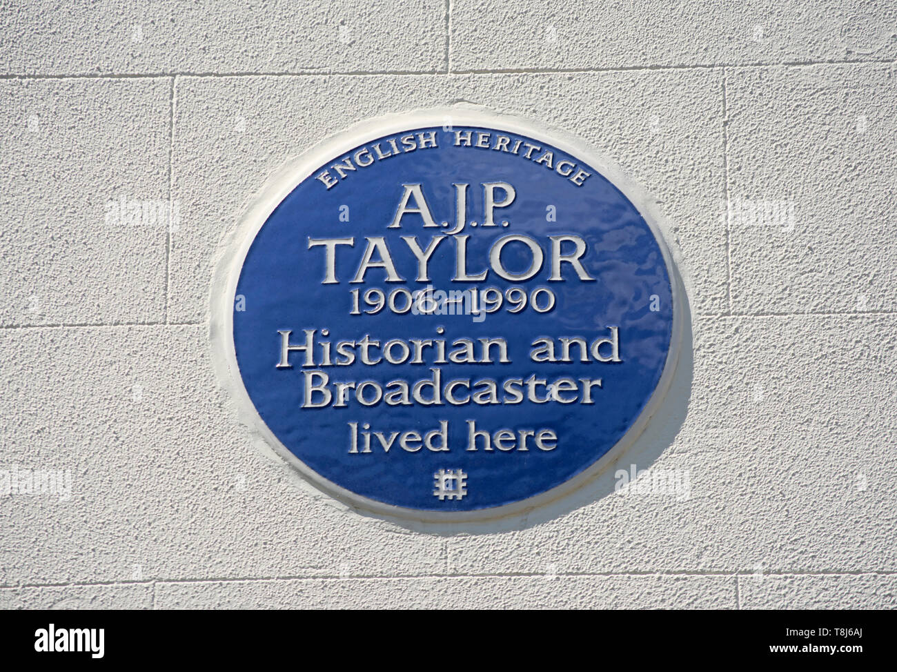 english heritage blue plaque marking a home of historian and broadcaster ajp taylor, primrose hill, london, england Stock Photo