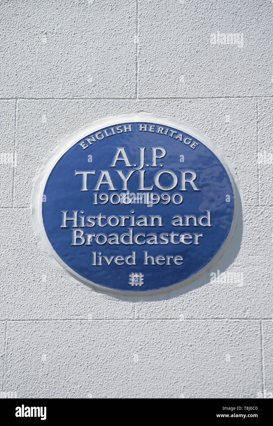 english heritage blue plaque marking a home of historian and broadcaster ajp taylor, primrose hill, london, england Stock Photo