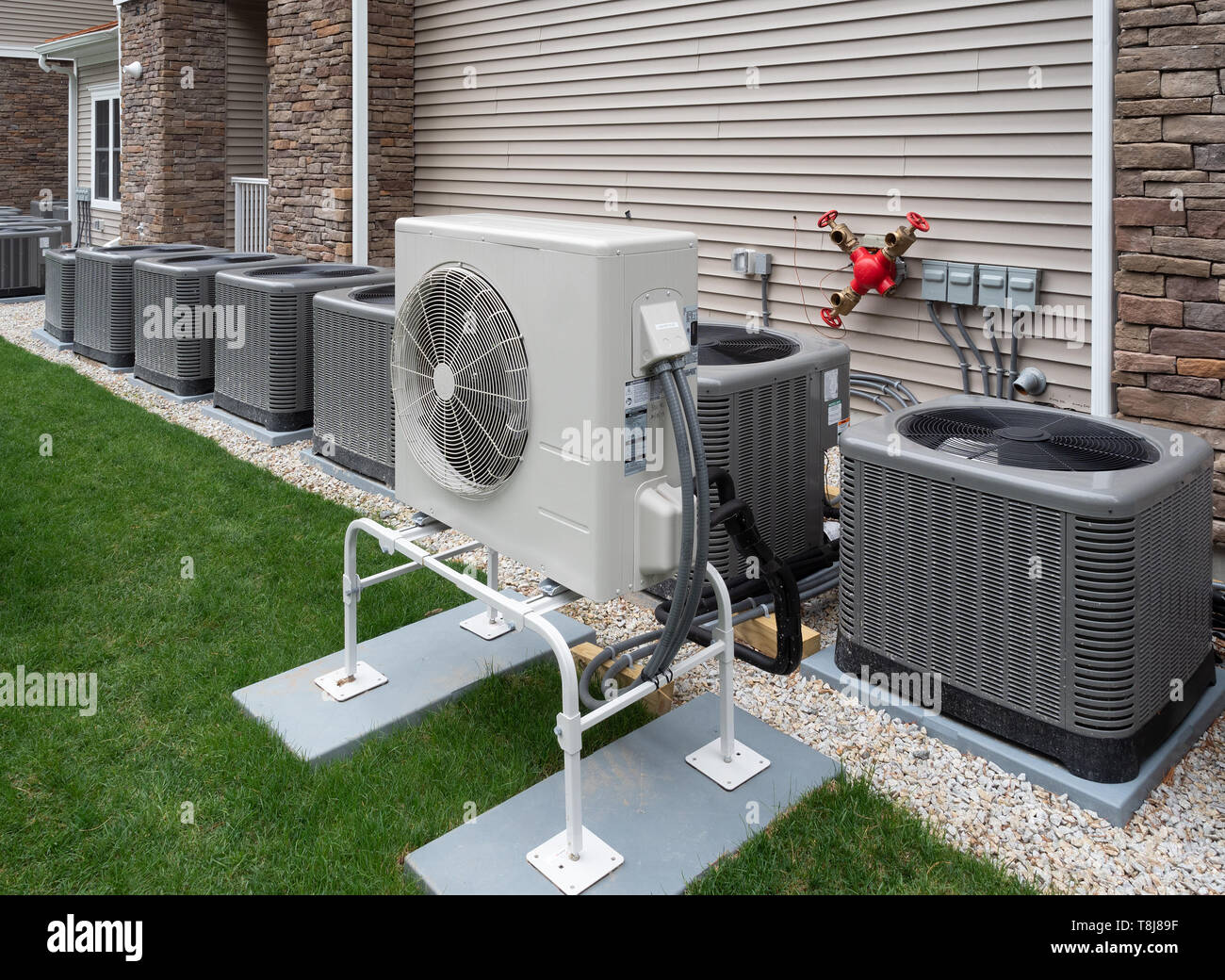Outdoor air conditioning and heat pump units Stock Photo