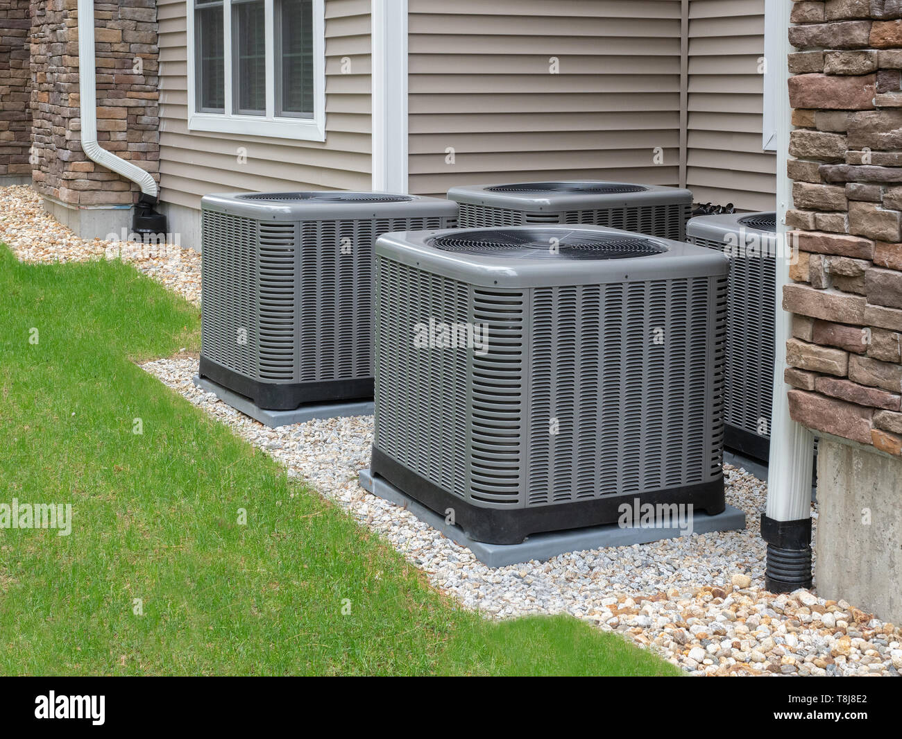 Outdoor air conditioning and heat pump units Stock Photo