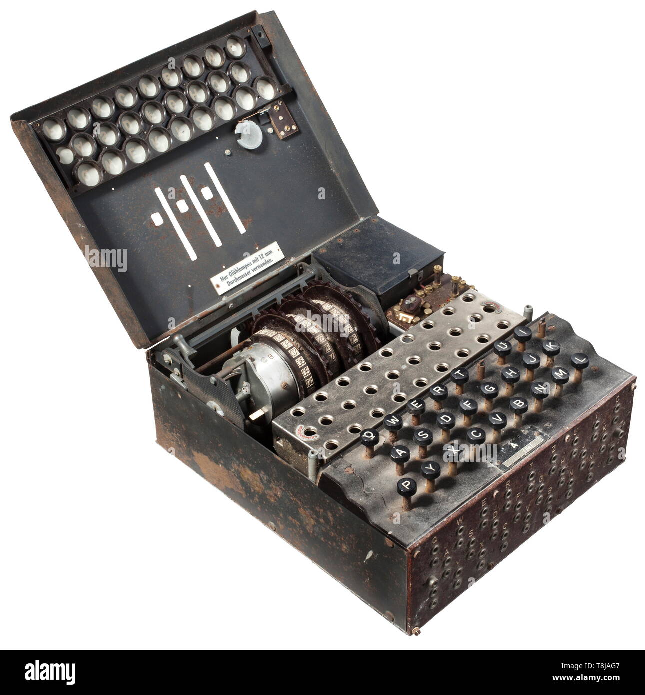 A German cypher machine 'Enigma I', Luftwaffe issue, 1944, model no. '20057', manufacturer 'jla' (Cypher Machine Company Heimsoeth und Rinke, Berlin) Three scrambling rotors with the numeric keys 1 to 26, the aluminium rotor assembly each with matching numbers 'A 20057'. In a light alloy box lacquered in field-grey with the handwritten number '20057' on the underside. The hinged lid with keyboard, power switch, and screw type terminals for external power supply. Partly functioning keyboard (two keys missing), plugboard at the front. Size 26 x 29 x ca. 13 cm. Untouched find , Editorial-Use-Only Stock Photo