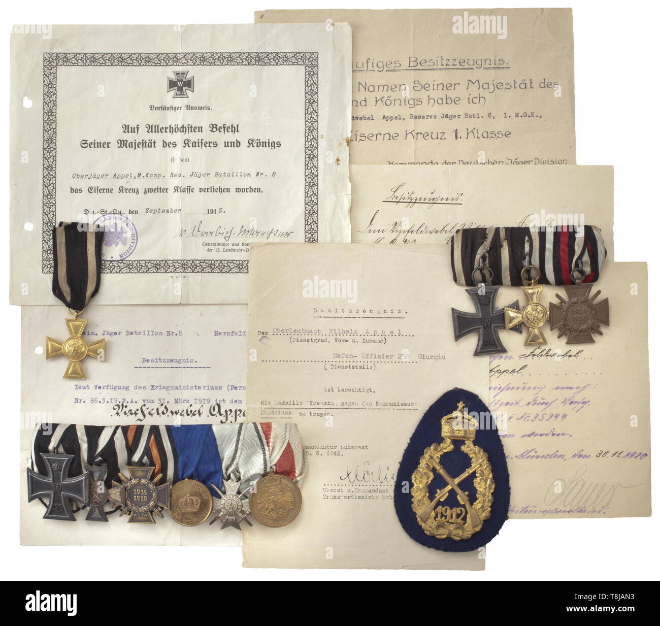 A decorations and documents grouping of later Oberleutnant and winner of the Golden Military Merit Cross (Enlisted Men's Pour le Mérite) Wilhelm Appel A six-piece orders clasp with: Iron Cross 2nd Class of 1914, Military Merit Cross in silver-gilt issue with punch mark accordimg to the regulations 'W 938' in the lower cross arm, German Empire: Honour Cross of the World War 1914/1918 for Combatants 1934, Prussia: Long Service Award 2nd 20th century, Additional-Rights-Clearance-Info-Not-Available Stock Photo