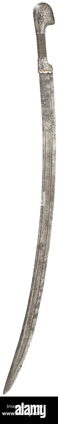 A Caucasian shashka, circa 1900 Curved blade with false edge and two fullers. Typical, nielloed silver hilt with silver grip. Blade somewhat stained and pitted, grip with small crack. Length 94 cm. historic, historical, Ottoman, Orient, Oriental, Asia, Asian, 20th century, Additional-Rights-Clearance-Info-Not-Available Stock Photo