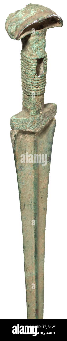 A bronze sword, Luristan, 1200 - 1000 BC Bronze with encrusted, partially removed, green patina. Double-edged, pointed blade with rounded central ridge. Oval grip with cast grip winding and semicircular pommel. The grip slightly cracked. Length 64 cm. historic, historical, ancient world, Additional-Rights-Clearance-Info-Not-Available Stock Photo