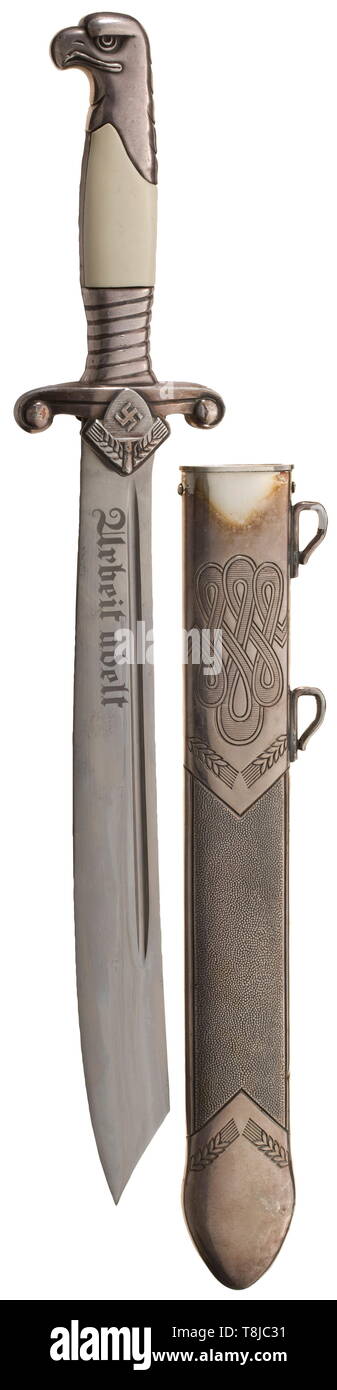 A hewer M 37 for RAD leaders Very well-preserved hewer blade with etched maker's logo of Eickhorn, Solingen and motto. The grip with almost complete silver-plating, one of the white plastic grip plates with a stress crack. Silver-plated iron scabbard. Length 40 cm. historic, historical, Reichsarbeitsdienst, Reich Labor Service, State Labour Service, organisation, organization, organizations, organisations, NS, National Socialism, Nazism, Third Reich, German Reich, Germany, National Socialist, Nazi, Nazi period, fascistic, fascism, utensil, piece of equipment, utensils, acce, Editorial-Use-Only Stock Photo