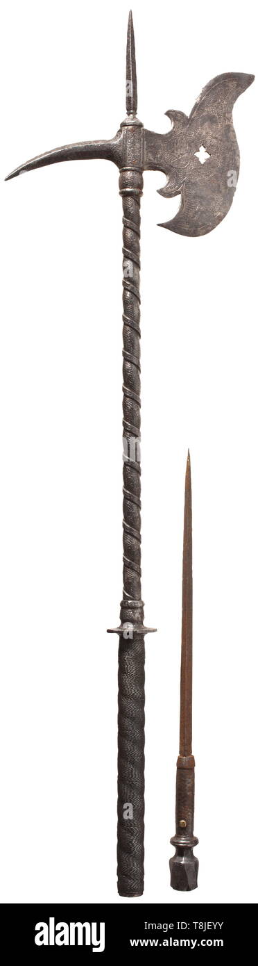 A large battle axe, historicism in the Saxon style, circa 1580 Curved axe blade with quatrefoil perforation and a strong quadrangular beak on the back. Hollow-forged, spirally grooved iron haft with slender spike of diamond section. Grip with iron wire winding and octagonal guard disk. Faceted pommel. Estoc with bayonet lock inside the haft. All surfaces richly covered with etched decoration of tendrils and trophies on dotted ground, the blade with the Saxon coat of arms on one side. Traces of corrosion. Length 97 cm. historic, historical, tool, , Additional-Rights-Clearance-Info-Not-Available Stock Photo