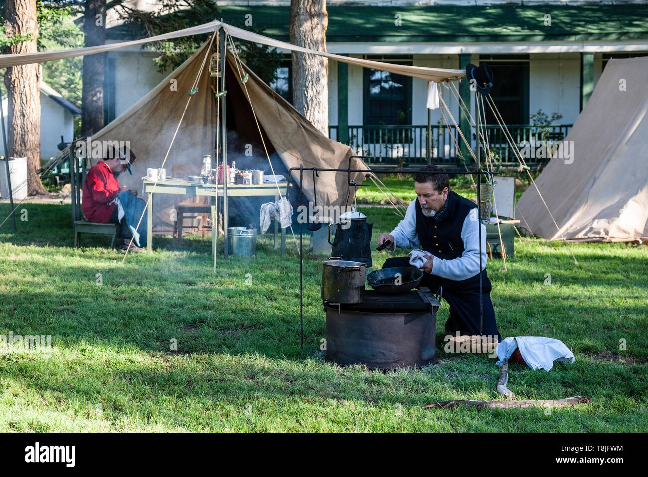 Civil War Era Union soldier reenactors cooking at camp, Fort Santon Live!, Fort Stanton, New Mexico USA Stock Photo