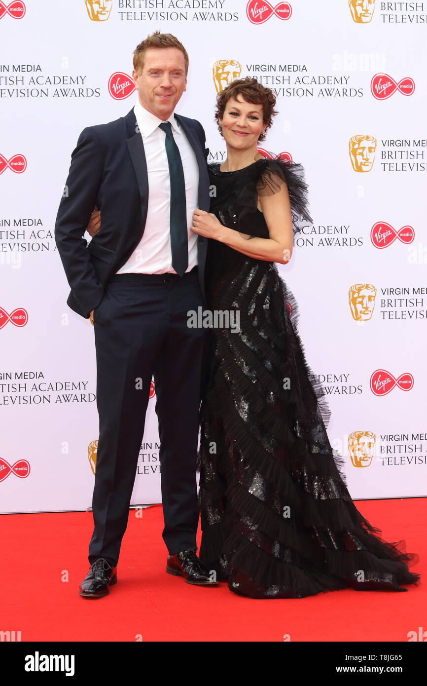 Damien Lewis and Helen McCrory are  seen on the red carpet during the Virgin Media BAFTA Television Awards 2019 at The Royal Festival Hall in London. Stock Photo
