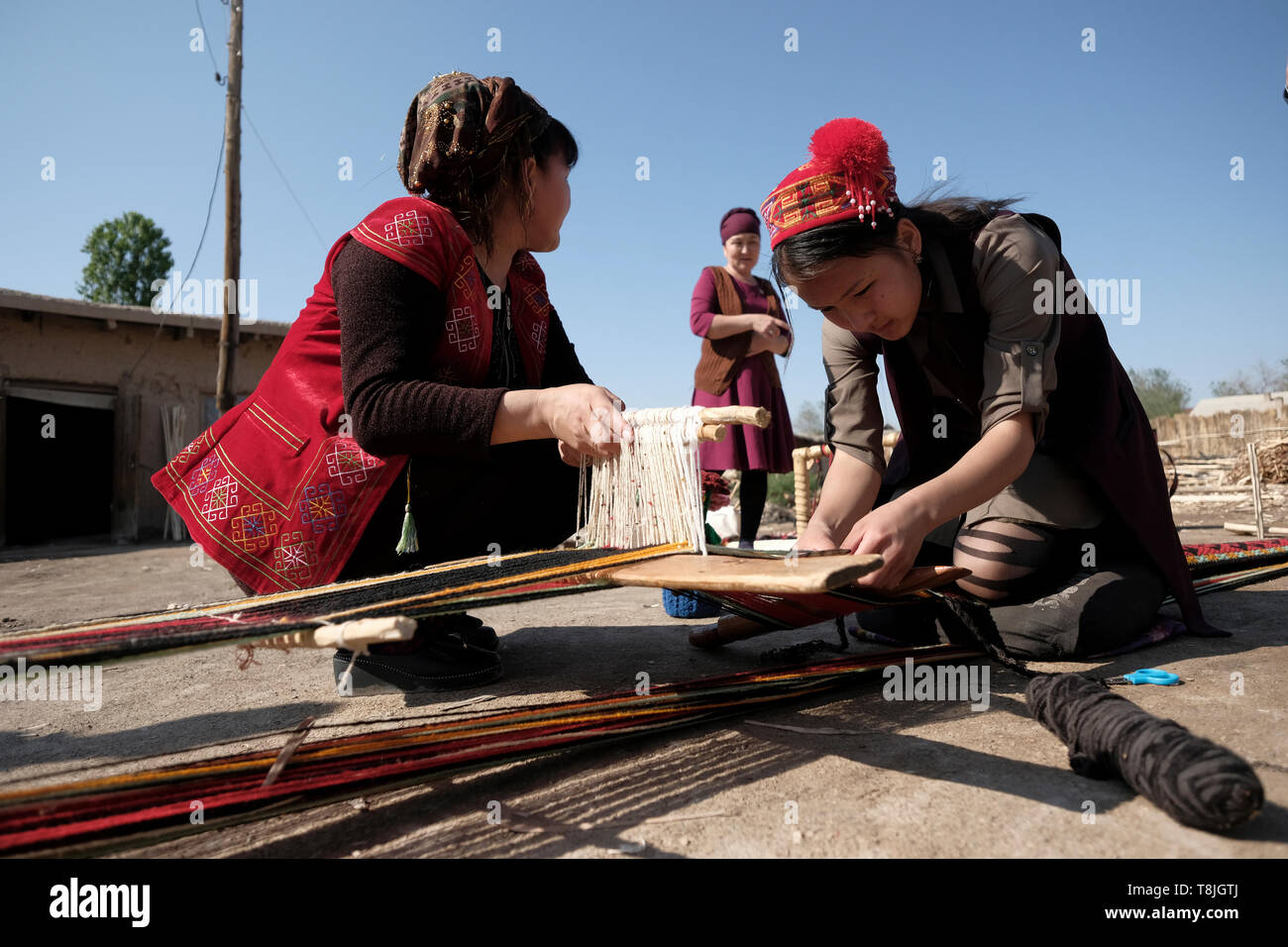 Uzbek Woman Weaving Decorations And Bands For Yurts In A Small