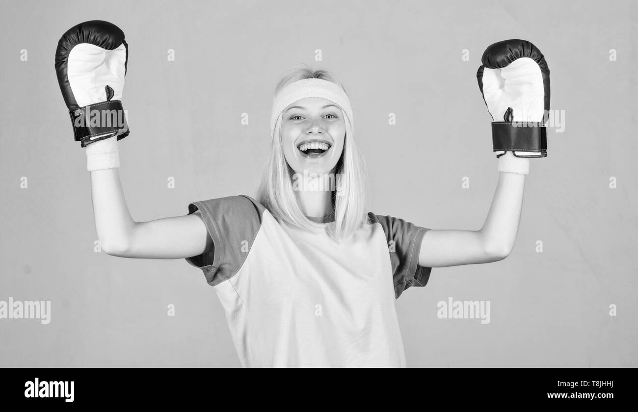 Boxing sport concept. Cardio boxing exercises to lose weight. Femininity and strength balance