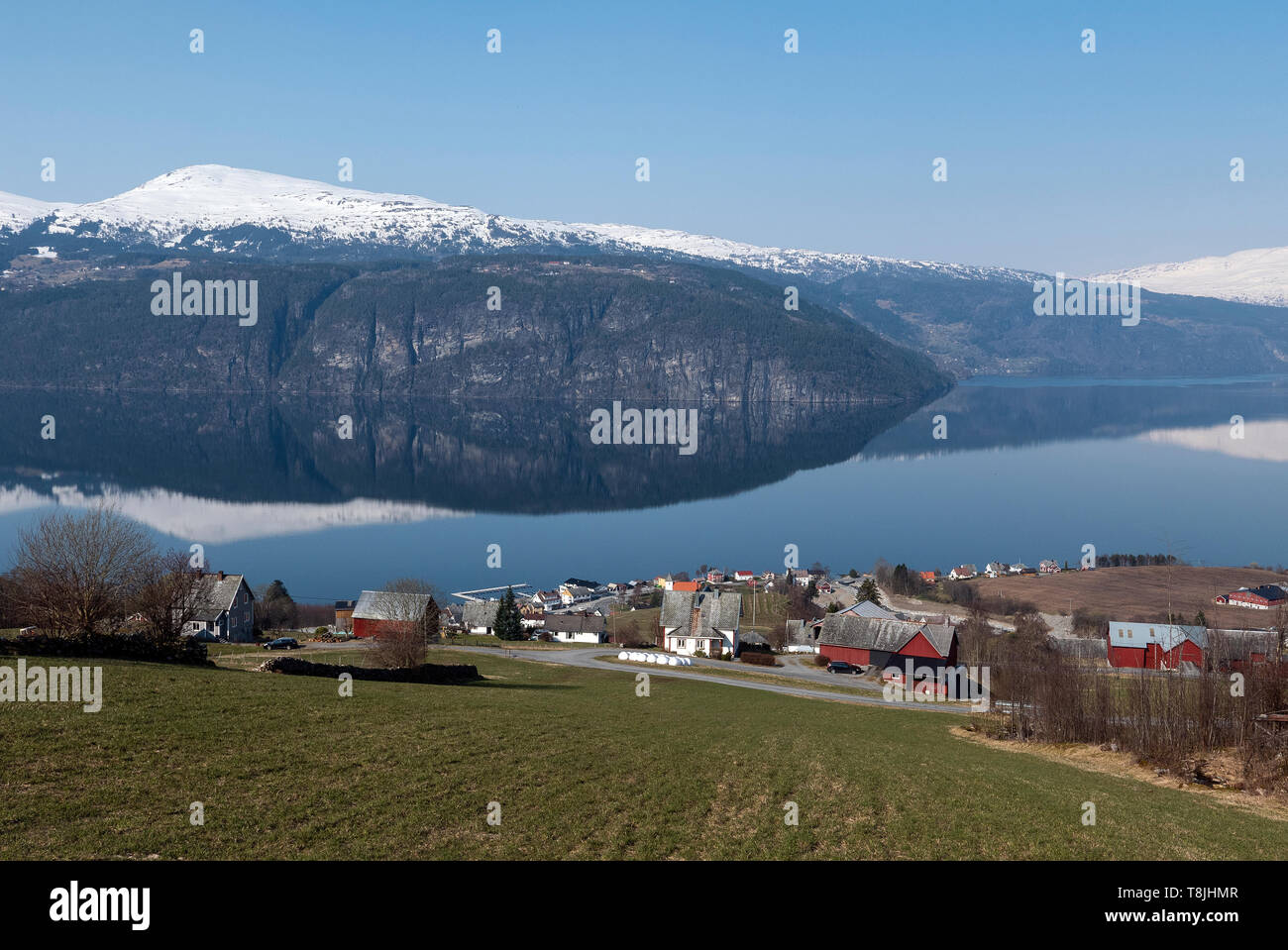 Idyllic Utvik in Sogn og Fjordane county, Nordfjord, Norway is a small farming community on the southern shore of the Nordfjord not far from Olden. Stock Photo