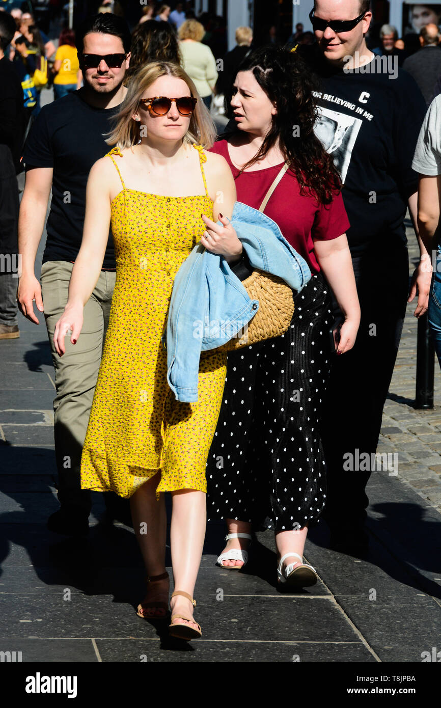 Woman wearing a yellow dress hi-res stock photography and images - Alamy