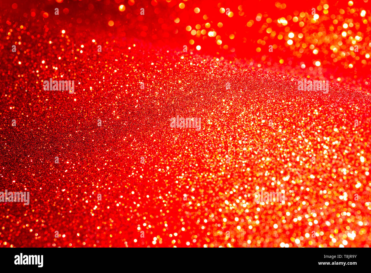 Red glitter vintage lights background. defocused. Texture Pattern Background. Concept Festive overlay Stock Photo