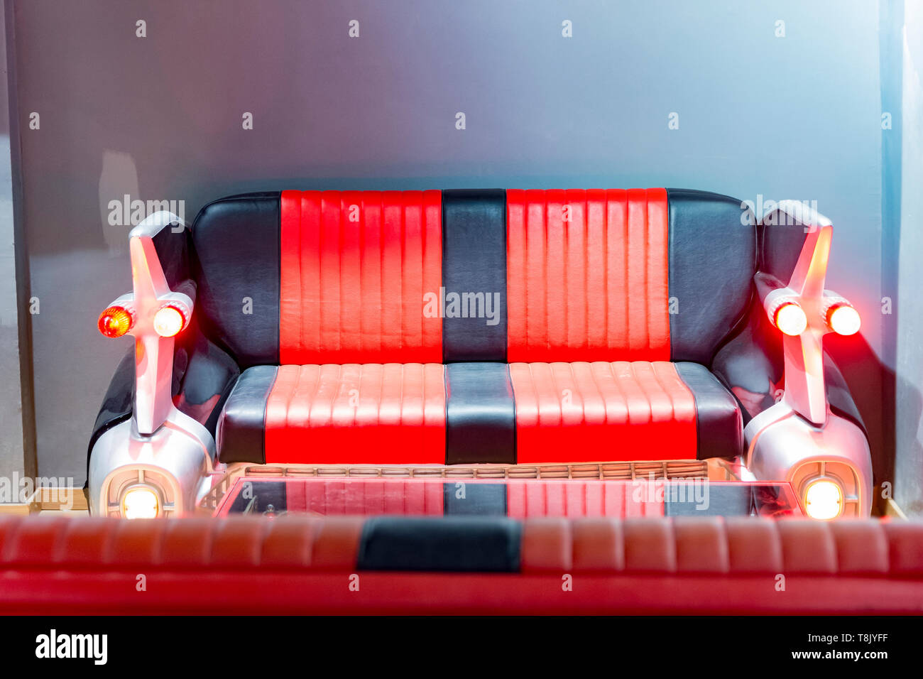 cadillac car alike red and black sofa with rear lights Stock Photo - Alamy