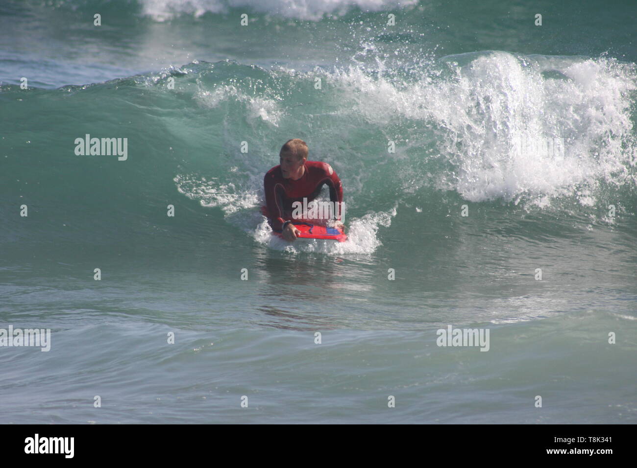 Surfing australia wet suit hires stock photography and images Alamy