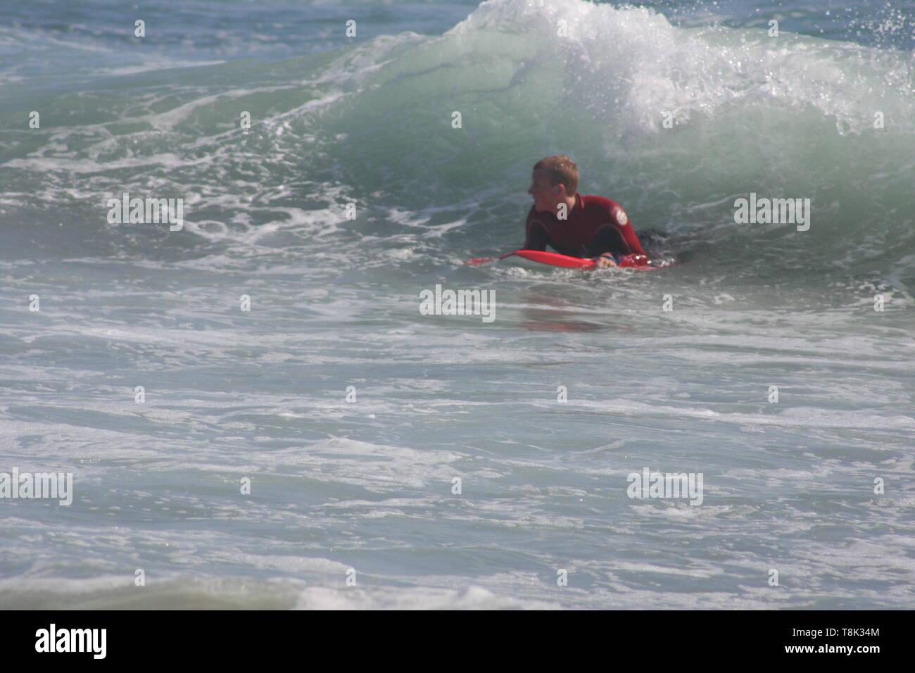 Surfing australia wet suit hi-res stock photography and images - Alamy