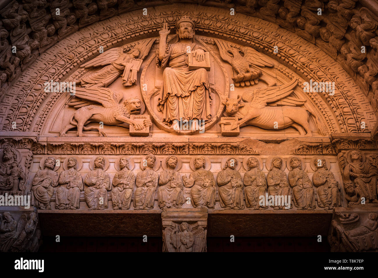 West portal of Cathedral of Saint Trophime in Arles. Tympanum shows Christ with the symbols of the Evangelists. National Heritage Site of France. UNES Stock Photo